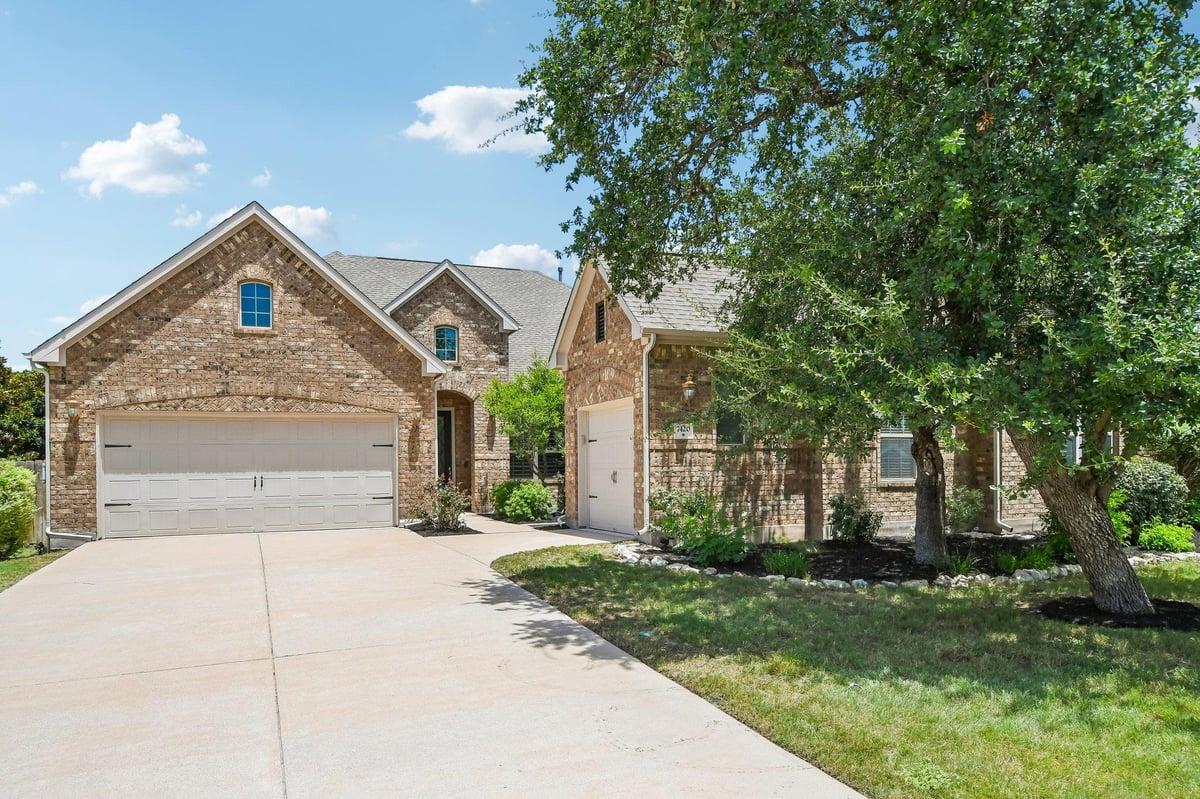 View 7420 Turnback Ledge TRL in Tessera On Lake Travis Ph 1A 7420 Turnback Ledge TRL - front exterior - Luxury home in Tessera On Lake Travis Ph 1A, Lago Vista, TX