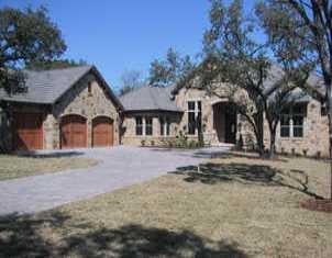 View 7424 Oak Shores DR in Greenshores on Lake Austin 7424 Oak Shores DR - front exterior - Luxury home in Greenshores on Lake Austin, Austin, TX