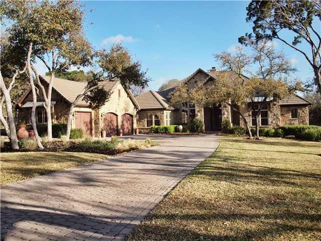 View 7424 Oak Shores DR in Greenshores On Lake Austin Ph 01 7424 Oak Shores DR - property photo 1 - Luxury home in Greenshores On Lake Austin Ph 01, Austin, TX