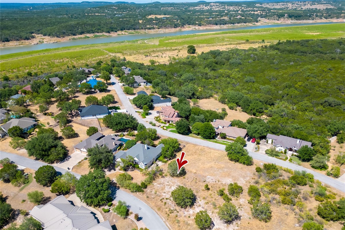 View 743 Wesley Ridge Dr in The Point At Ridge Harbor 743 Wesley Ridge Dr - front exterior - Luxury lot in The Point At Ridge Harbor, Spicewood, TX