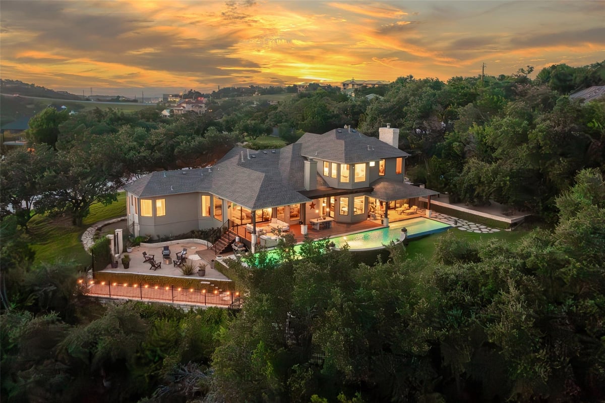 View 7501 Newhall LN in Rob Roy On Creek Sec 01 7501 Newhall LN - front exterior - Luxury home in Rob Roy On Creek Sec 01, Austin, TX