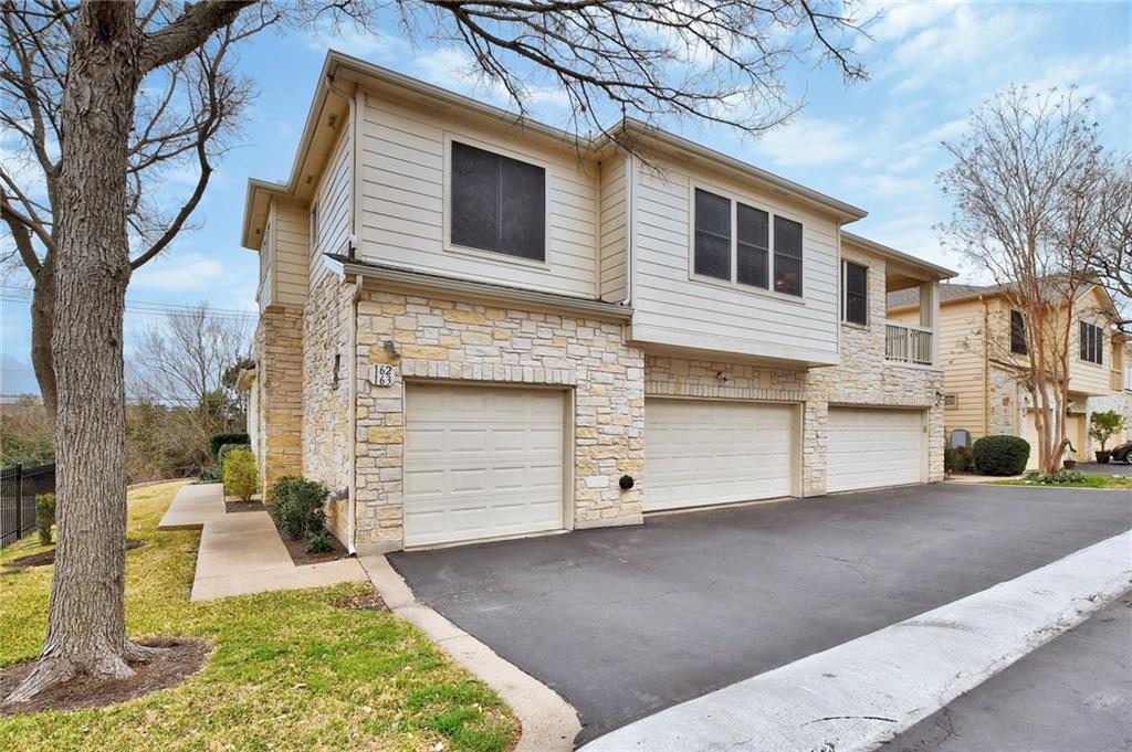 View 7501 Shadowridge Run Unit #162 in Laurels At Legend Oaks Ph 2 A 7501 Shadowridge Run Unit #162 - front exterior - Luxury home in Laurels At Legend Oaks Ph 2 A, Austin, TX