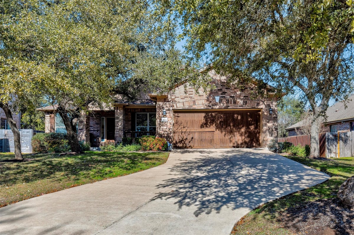 View 7504 Brecourt Manor Way in Lacrosse Sec 02 7504 Brecourt Manor Way - front exterior - Luxury home in Lacrosse Sec 02, Austin, TX