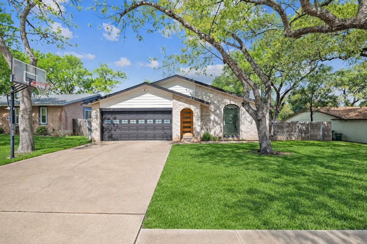 7504 Whispering Oaks Dr - front exterior - Luxury home in Cherry Creek Ph 07 Sec 02, Austin, TX