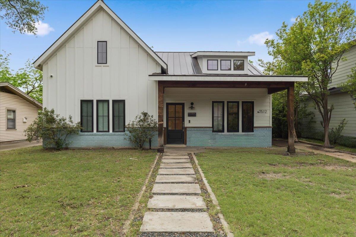 7512 Hardy Dr - front exterior - Luxury home in Crestview Add Sec 04, Austin, TX