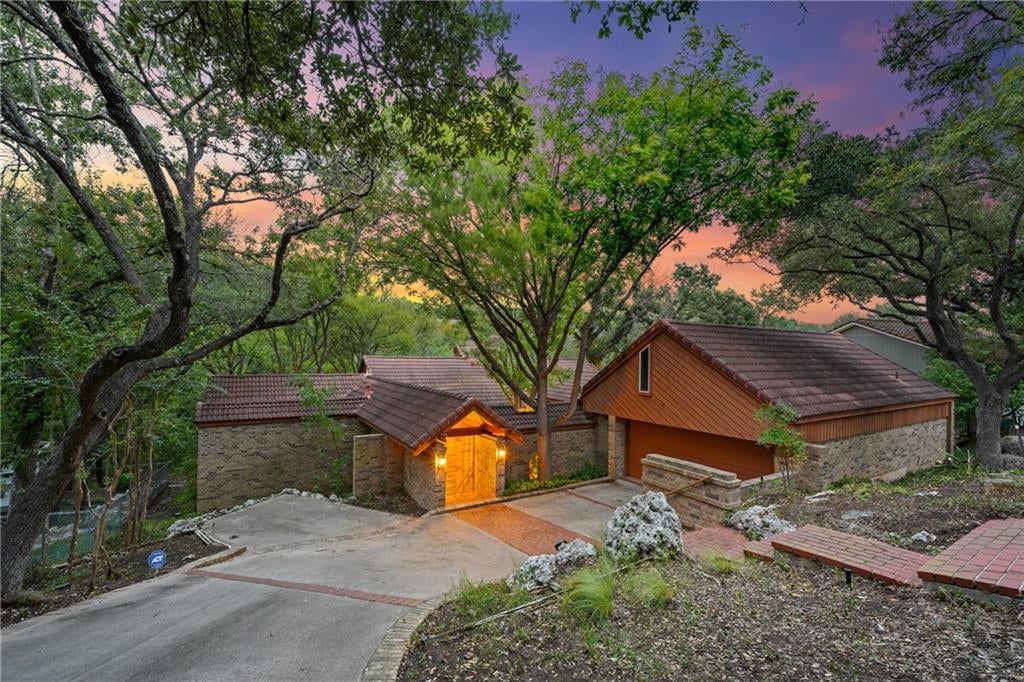 View 7514 Stonecliff DR in Northwest Hills Northwest Oaks 7514 Stonecliff DR - front exterior - Luxury home in Northwest Hills Northwest Oaks, Austin, TX