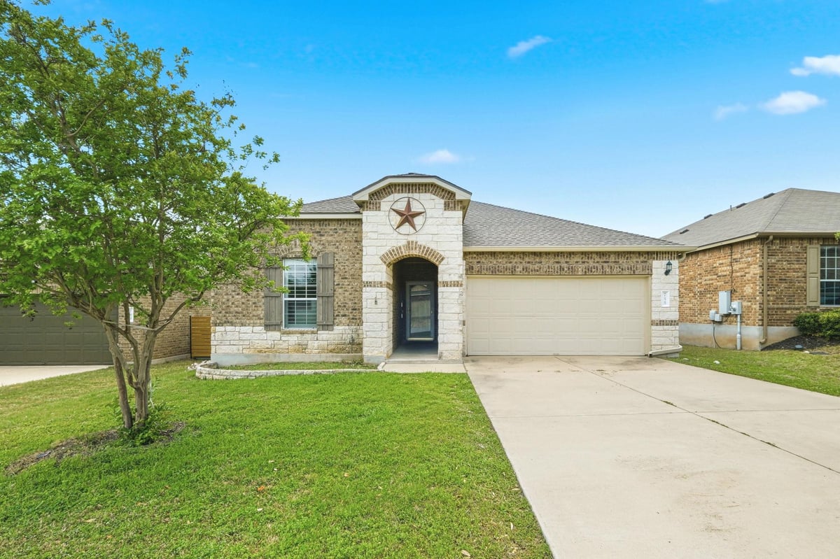 View 755 Hoot Owl Ln S in Summerlyn South Sec 1 755 Hoot Owl Ln S - front exterior - Luxury home in Summerlyn South Sec 1, Leander, TX
