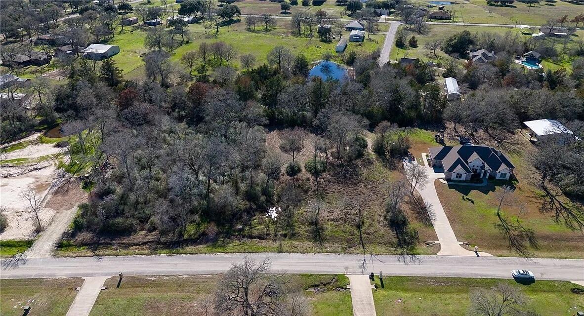 View 7598 Field Creek Estates DR in Field Creek Estates Ph 2 7598 Field Creek Estates DR - front exterior - Luxury lot in Field Creek Estates Ph 2, Bryan, TX