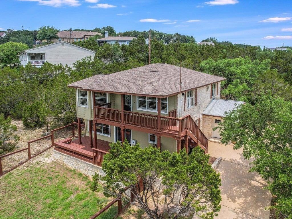 View 7606 Bar K Ranch Rd in Bar-K Ranches 08 Amd 7606 Bar K Ranch Rd - front exterior - Luxury home in Bar-K Ranches 08 Amd, Lago Vista, TX