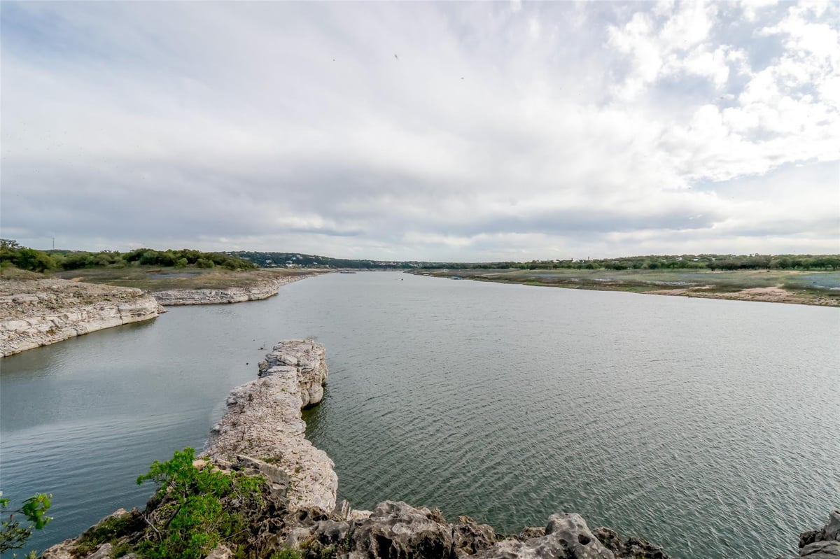 View 7608 Tessera Pkwy in TESSERA ON LAKE TRAVIS PHS 1A 7608 Tessera Pkwy - front exterior - Luxury lot in TESSERA ON LAKE TRAVIS PHS 1A, Lago Vista, TX