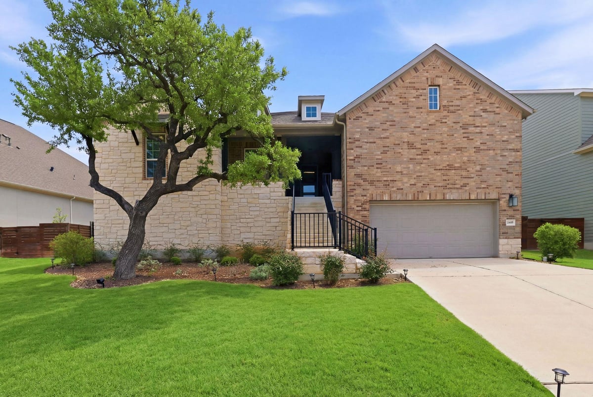 View 7609 Paruline Dr in Provence 7609 Paruline Dr - front exterior - Luxury home in Provence, Austin, TX