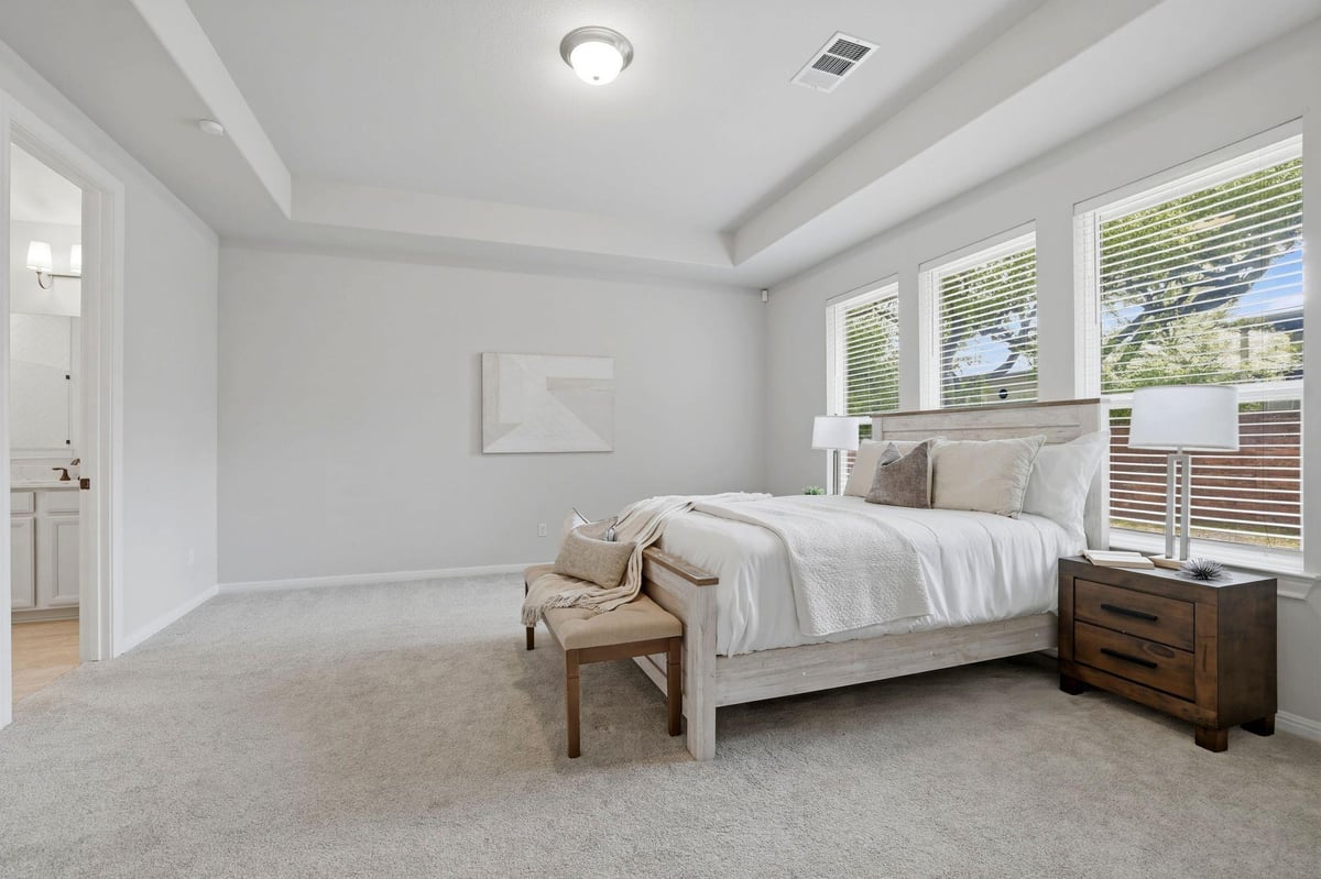 Primary bedroom at 7609 Paruline Dr - 4 bed 3 bath home