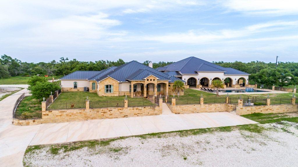 View 761 Allison Ln in Trails End Ranch 761 Allison Ln - front exterior with 761 Allison Ln in San Marcos - Luxury home in Trails End Ranch, San Marcos, TX