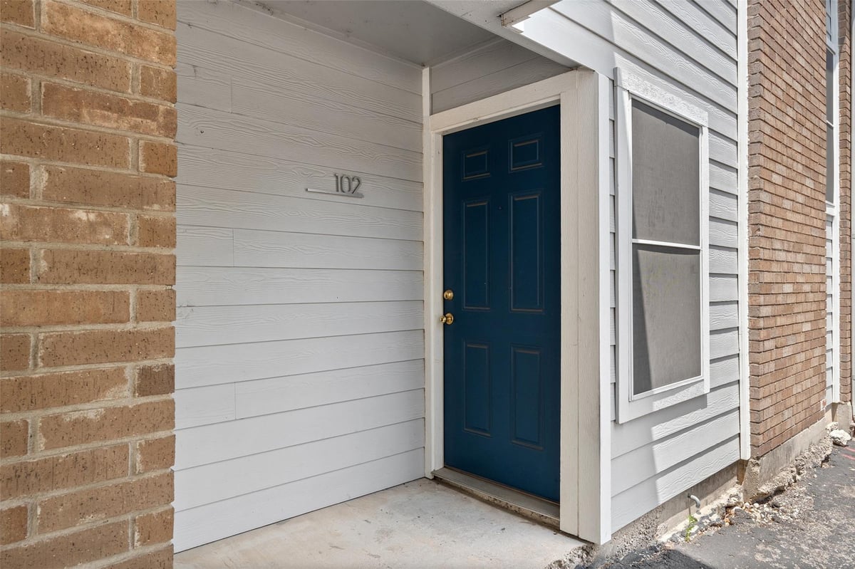 View 7635 Guadalupe ST Unit #102 in Summerwind Townhome Condo Amd 7635 Guadalupe ST Unit #102 - property photo 1 - Luxury home in Summerwind Townhome Condo Amd, Austin, TX