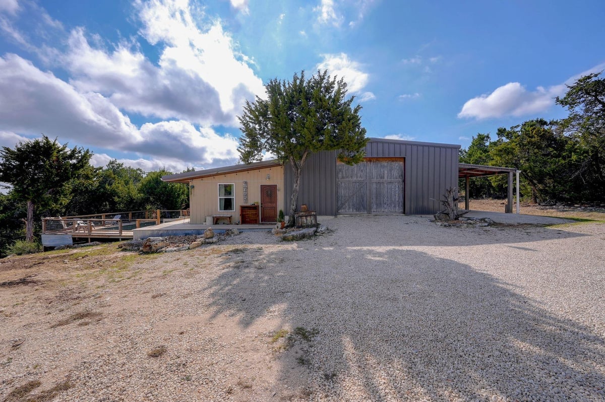 View 7655 Mount Sharp Rd in Mount Sharp Ranch 7655 Mount Sharp Rd - property photo 1 - Luxury home in Mount Sharp Ranch, Wimberley, TX