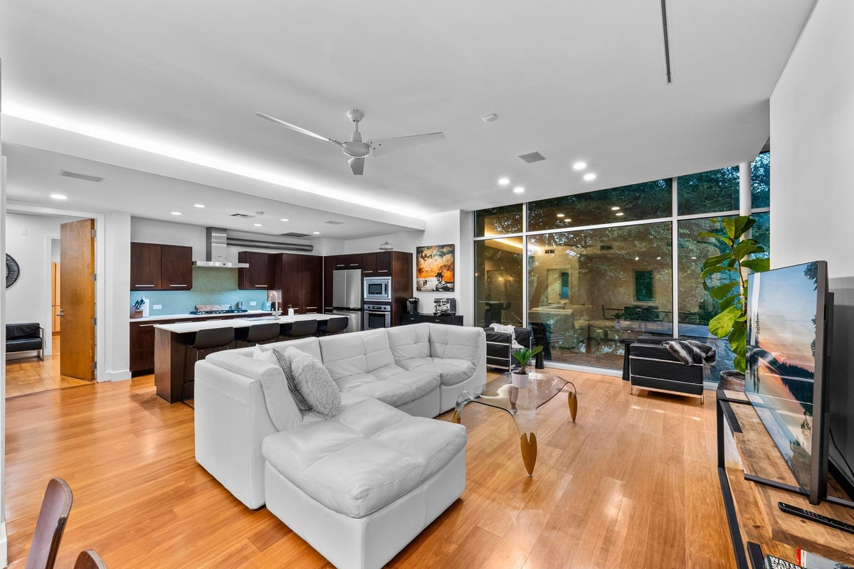 View 7689 Delwau LN in Rayviva Price Acres 7689 Delwau LN - front exterior - Luxury home in Rayviva Price Acres, Austin, TX
