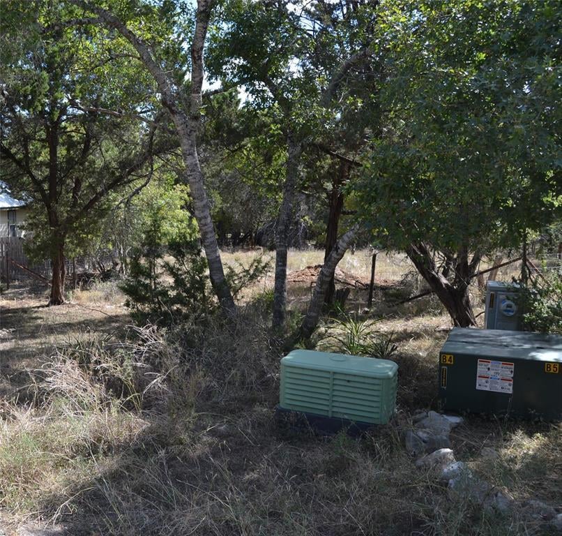 Primary bedroom at 77 E Valley Spring Rd - Woodcreek, Wimberley, TX