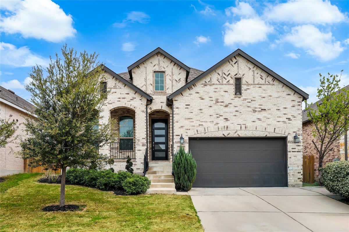 View 7705 Pace Ravine Dr in Tessera 7705 Pace Ravine Dr - front exterior - Luxury home in Tessera, Lago Vista, TX