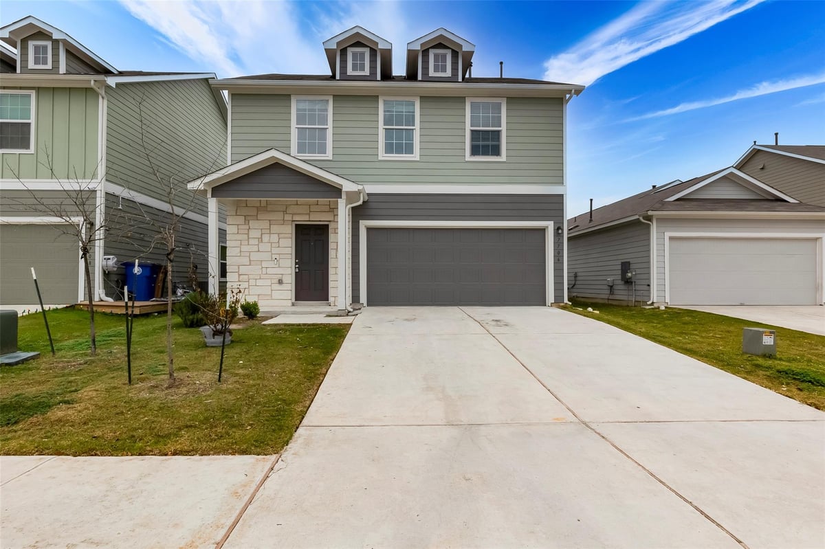 View 7706 Poppy Petal LOOP in Sun Chase South Sec 8 7706 Poppy Petal LOOP - front exterior - Luxury home in Sun Chase South Sec 8, Del Valle, TX