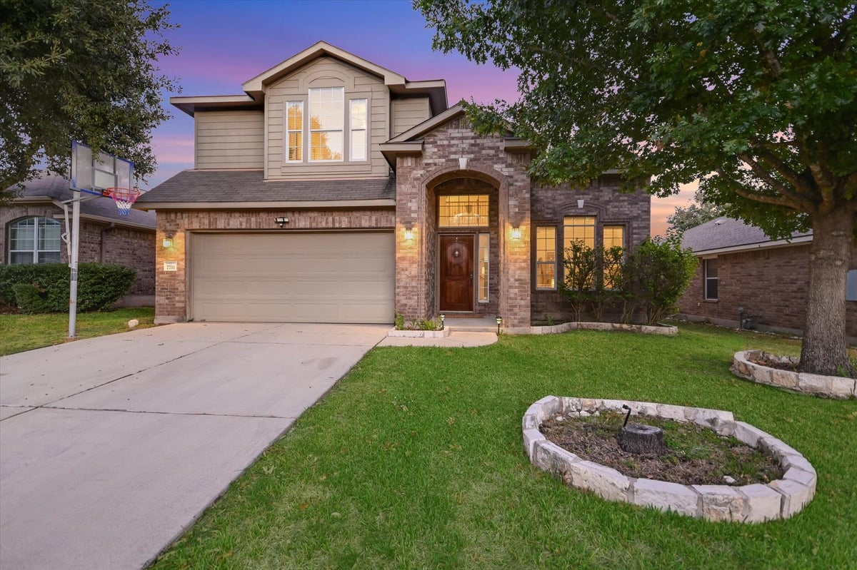 View 7711 Stephany Taylor Dr in Taylor Estates Sec 01 7711 Stephany Taylor Dr - front exterior - Luxury home in Taylor Estates Sec 01, Austin, TX