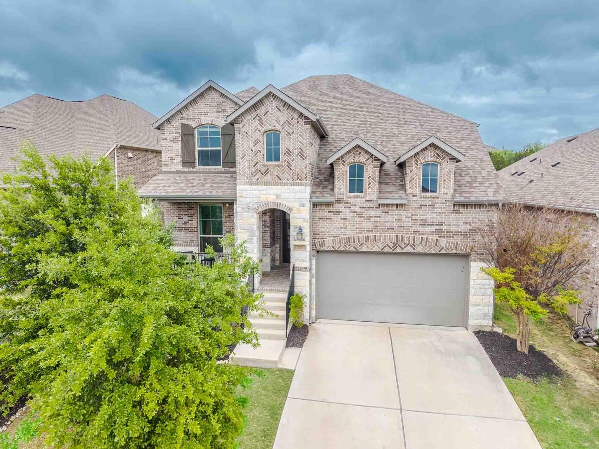 View 7717 Pace Ravine Dr in Tessera/Lk Travis Ph 1B1 7717 Pace Ravine Dr - front exterior - Luxury home in Tessera/Lk Travis Ph 1B1, Lago Vista, TX