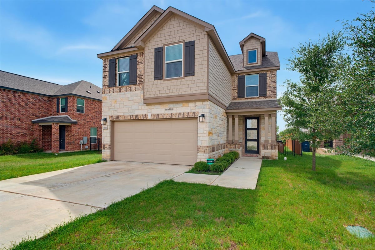 View 7801 Song Sparrow DR in Villas at McKinney Crossing 7801 Song Sparrow DR - front exterior - Luxury home in Villas at McKinney Crossing, Austin, TX