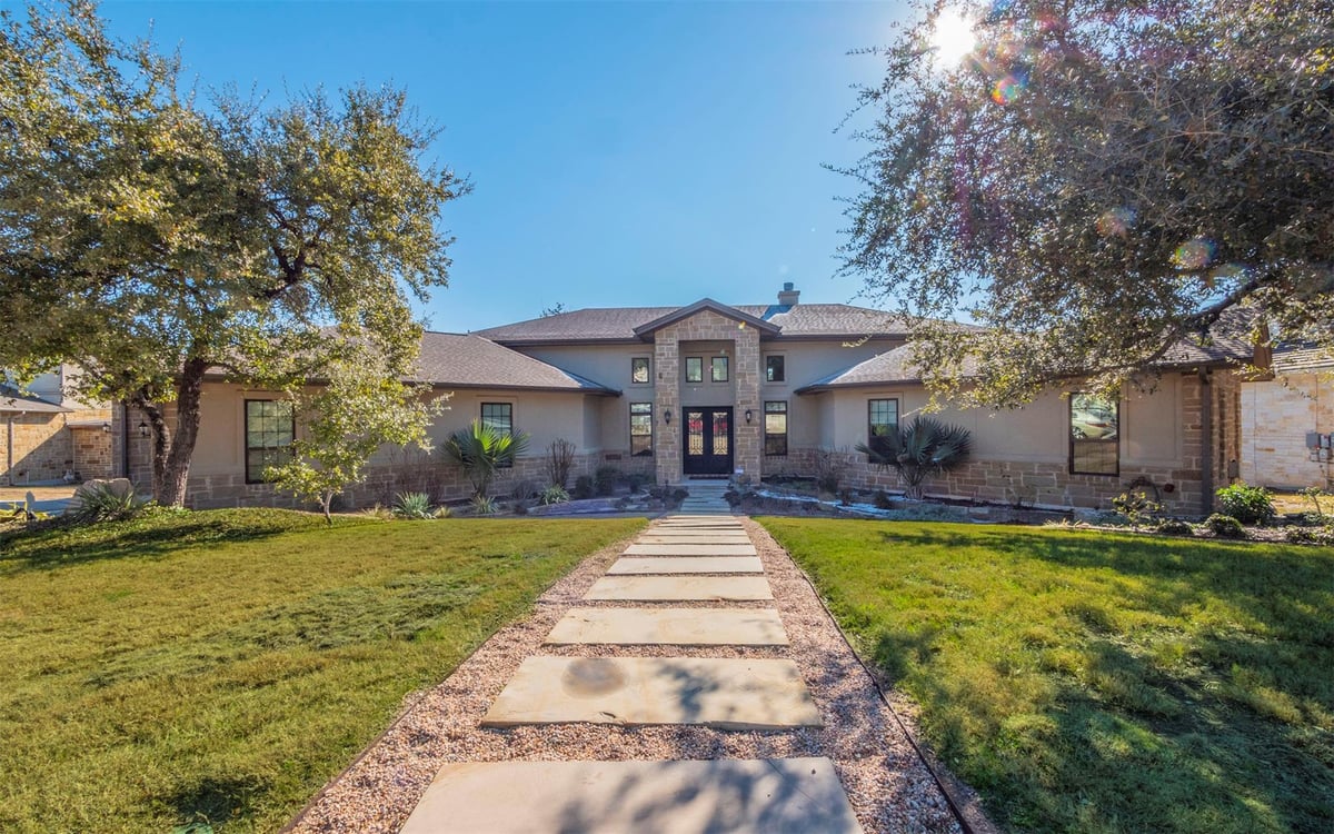 7804 Lazy River Cv - front exterior - Luxury home in Greenshores On Lake Austin Ph, Austin, TX
