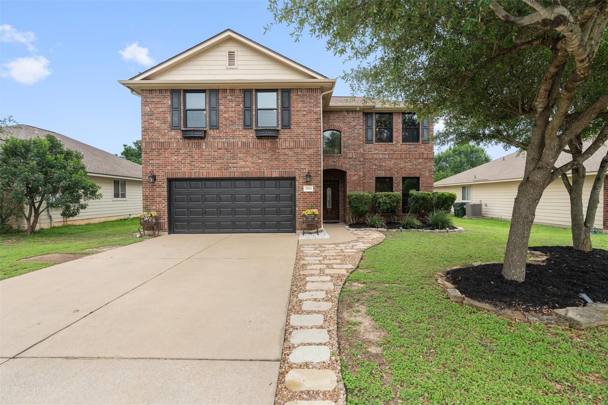 View 7804 Little Deer Trl in Villages Of Berry Creek Sec 01 7804 Little Deer Trl - front exterior - Luxury home in Villages Of Berry Creek Sec 01, Georgetown, TX