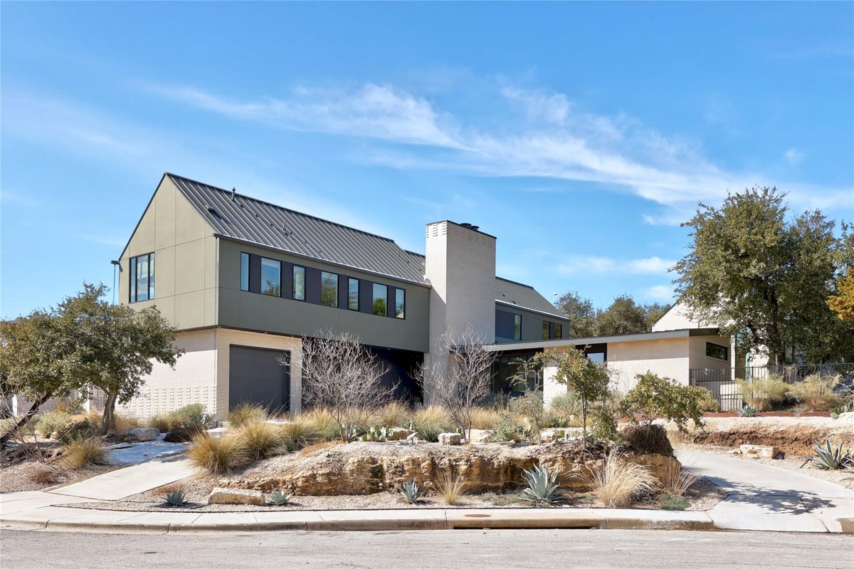 View 7805 Lazy River CV in Greenshores On Lake Austin Ph 7805 Lazy River CV - front exterior with modern Hill Country facade - Luxury home in Greenshores On Lake Austin Ph, Austin...