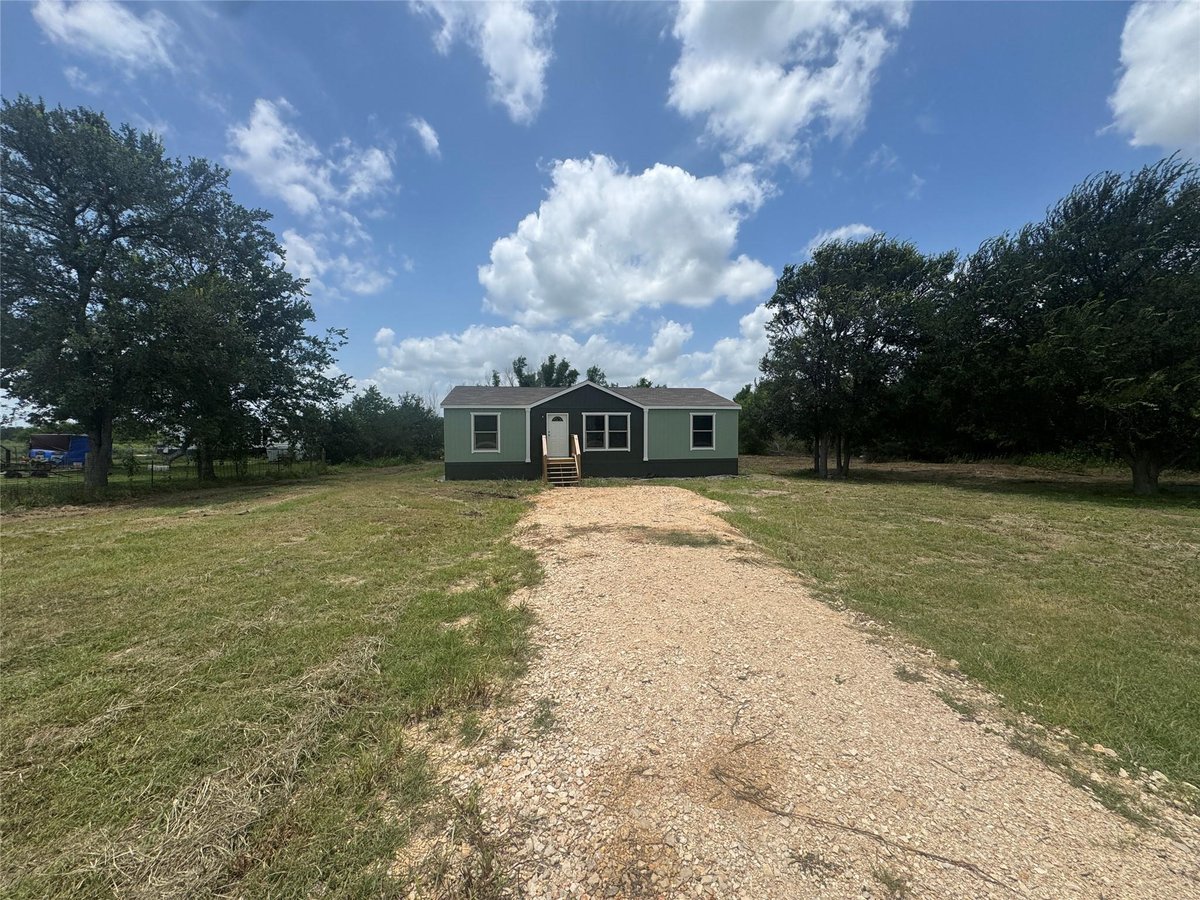 View 7855 Taylorsville RD in Windmill Hollow 7855 Taylorsville RD - front exterior - Luxury home in Windmill Hollow, Dale, TX