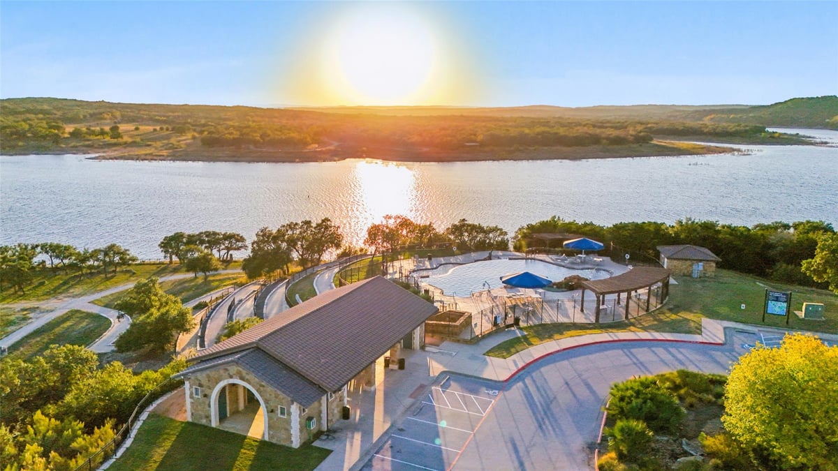 View 7906 Turnback Ledge Trl in Tessera On Lake Travis Ph 1A 7906 Turnback Ledge Trl - property photo 1 - Luxury home in Tessera On Lake Travis Ph 1A, Lago Vista, TX