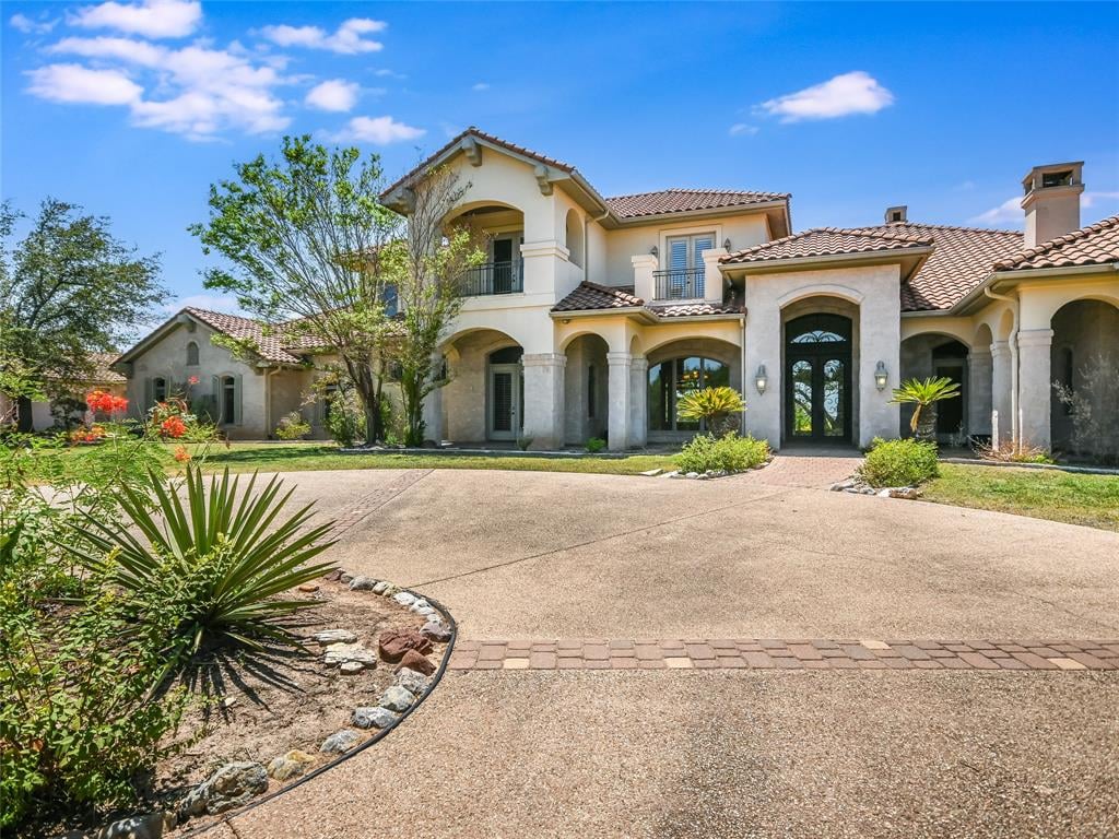 View 7927 Escala Dr in Barton Creek Sec J Ph 02 7927 Escala Dr - front exterior - Luxury home in Barton Creek Sec J Ph 02, Austin, TX