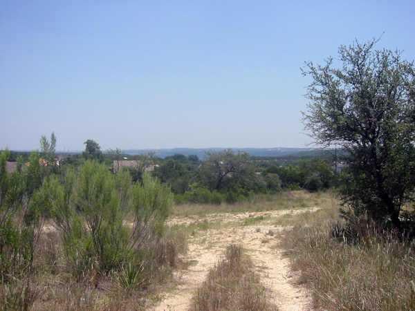 View 8, 9 Lakeway CTR 8, 9 Lakeway CTR - property photo 1 - Luxury home in Lakeway, TX