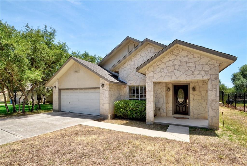 View 8 Pebblebrook LN 8 Pebblebrook LN - front exterior - Luxury home in Wimberley, TX