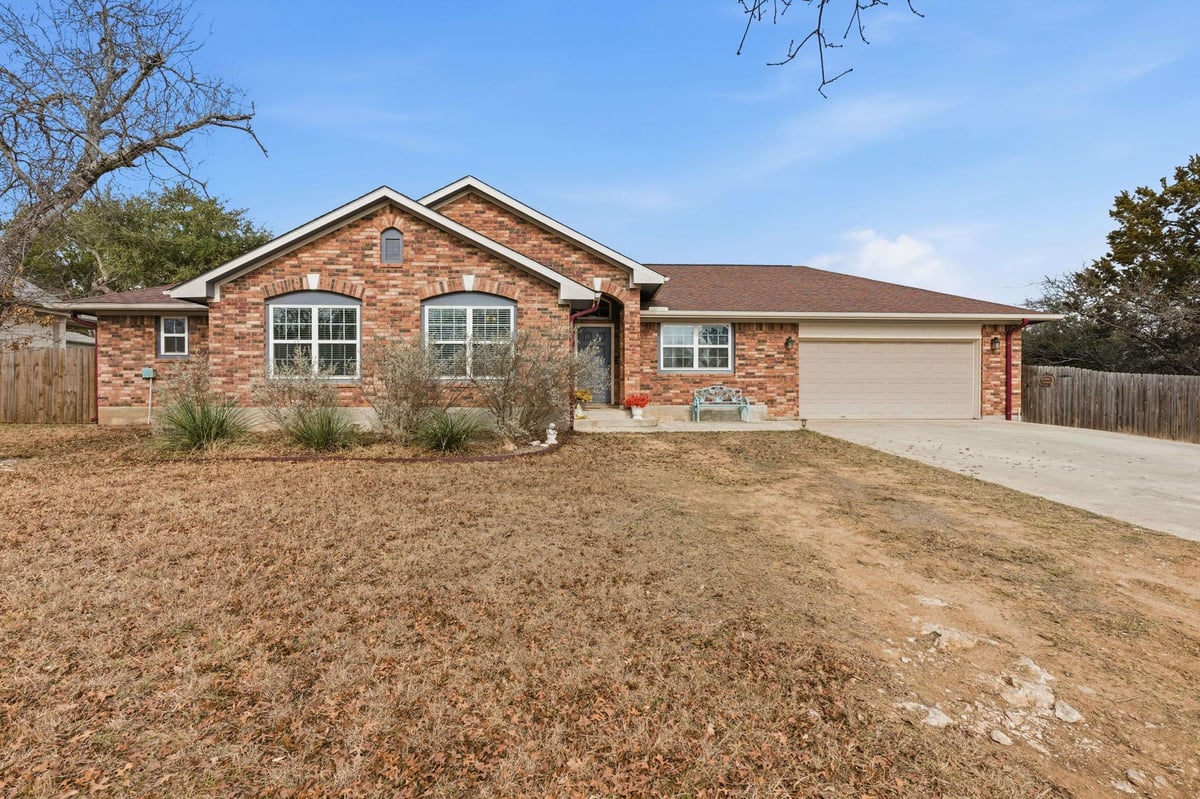 View 8 Stone Creek Cir in Woodcreek Sec 22 8 Stone Creek Cir - front exterior - Luxury home in Woodcreek Sec 22, Wimberley, TX
