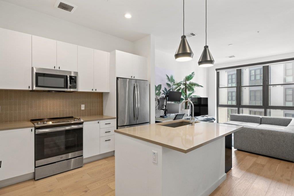 Living area at 800 Embassy Dr Unit #413 - 1 bed 1 bath home