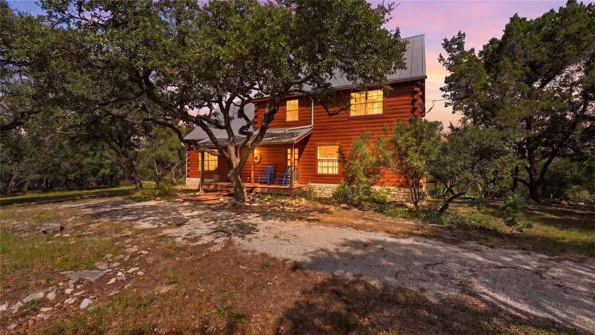 View 800 Woodcreek Ranch RD in Woodcreek Ranch Section I 800 Woodcreek Ranch RD - property photo 1 - Luxury home in Woodcreek Ranch Section I, Wimberley, TX