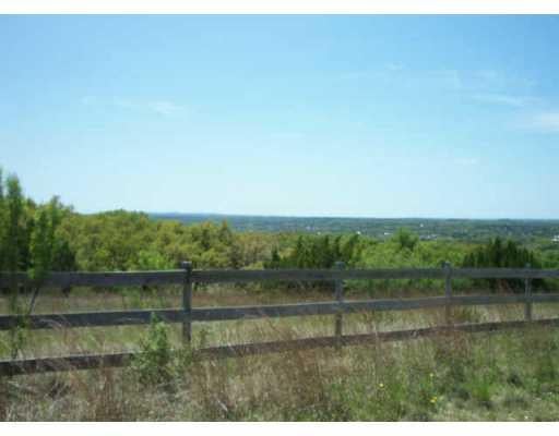View 8001 W Fitzhugh RD 8001 W Fitzhugh RD - front exterior - Luxury lot in Dripping Springs, TX