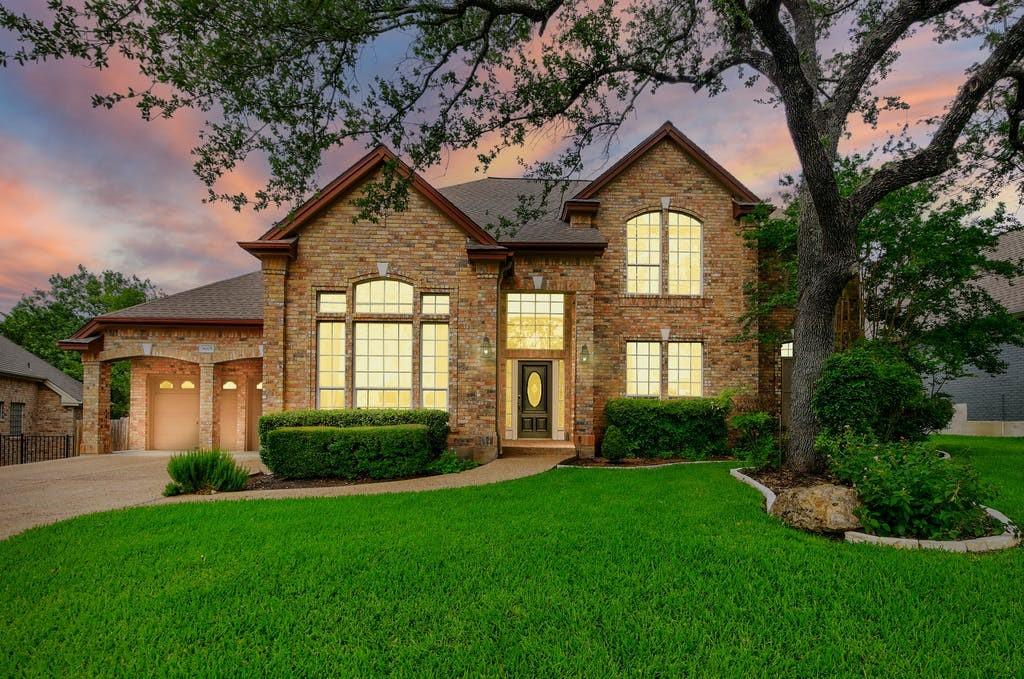 View 8005 High Hollow Dr in Canyon Ridge 8005 High Hollow Dr - front exterior - Luxury home in Canyon Ridge, Austin, TX