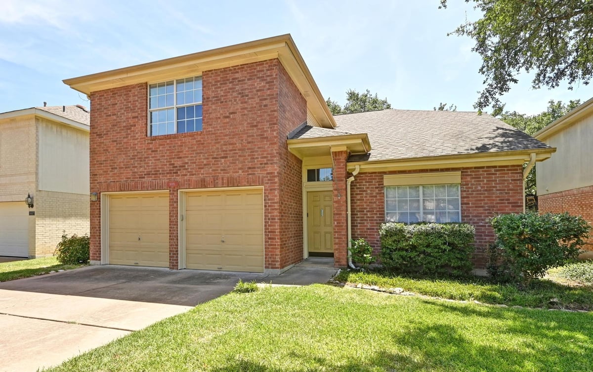8009 Cheno Cortina Trl - front exterior - Luxury home in Legend Oaks Phs A Sec 5a, Austin, TX