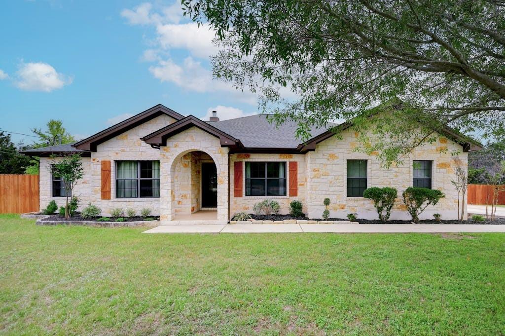 View 801 Mountain Crest Dr in Mountain Crest Unit 1 801 Mountain Crest Dr - front exterior - Luxury home in Mountain Crest Unit 1, Wimberley, TX