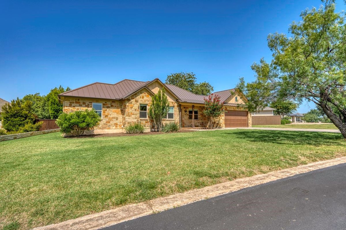 View 804 Four Oaks LN in Four Oaks 804 Four Oaks LN - front exterior - Luxury home in Four Oaks, Marble Falls, TX