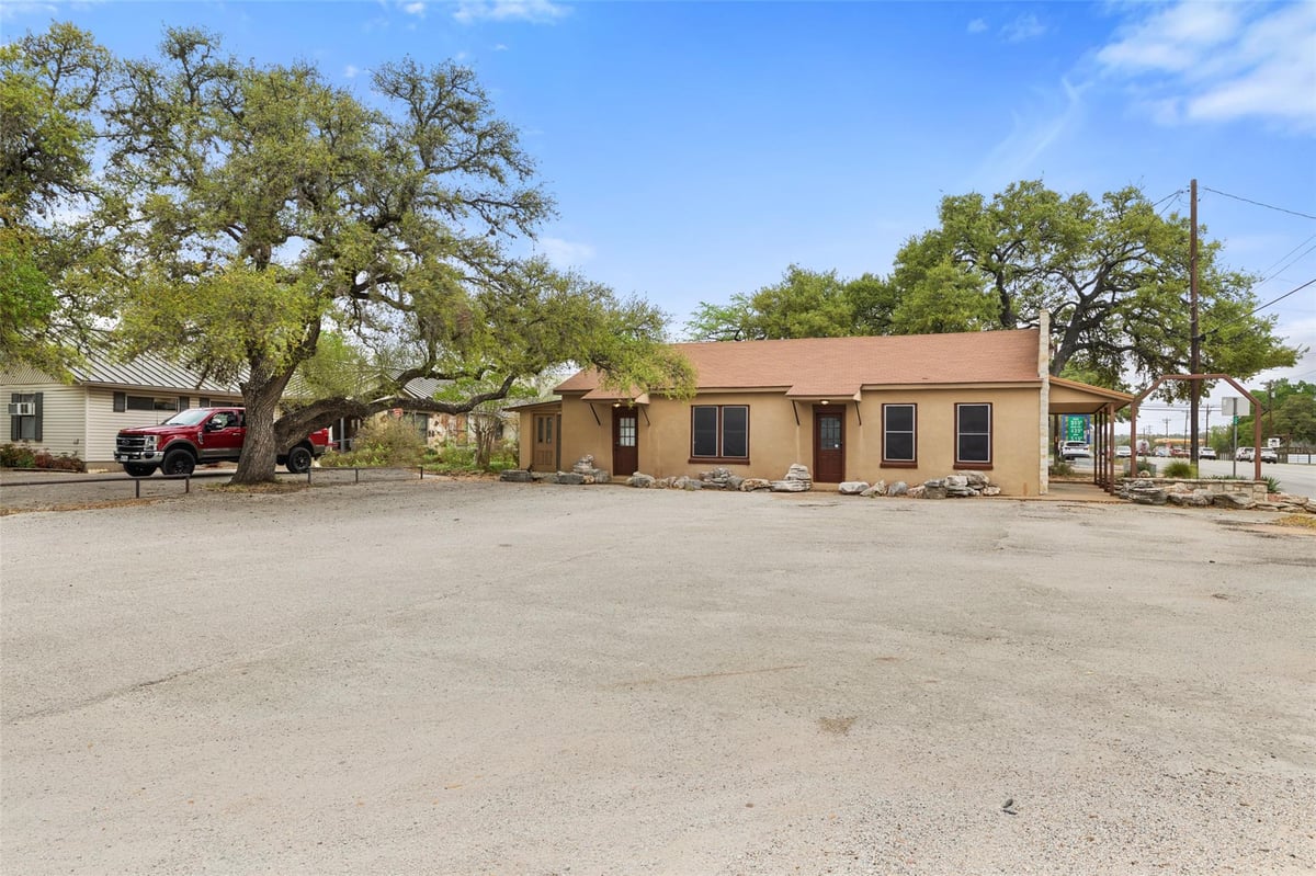 Primary bedroom at 807 Main St - Harrison Heirs, Blanco, TX