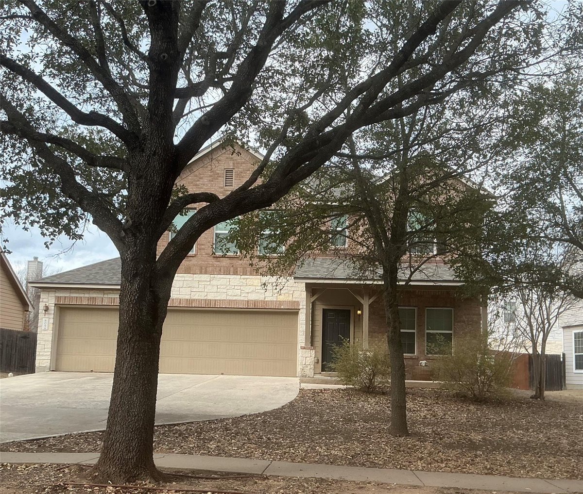 View 809 Hometown Pkwy in Hometown Kyle Sub Ph 2 809 Hometown Pkwy - front exterior - Luxury home in Hometown Kyle Sub Ph 2, Kyle, TX