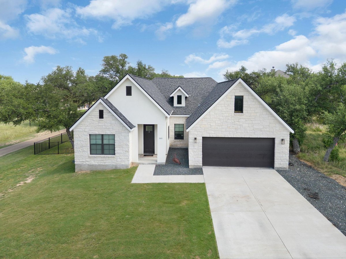View 809 John Price in Rockin J Ranch 809 John Price - front exterior - Luxury home in Rockin J Ranch, Blanco, TX