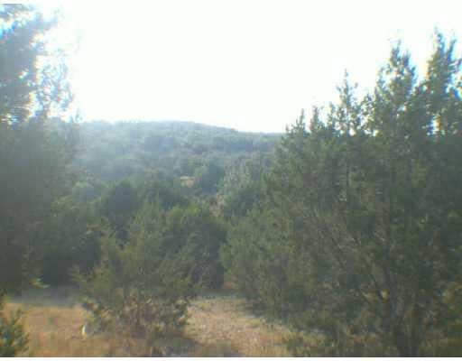 View 809 Newport DR 809 Newport DR - front exterior - Luxury lot in Spicewood, TX