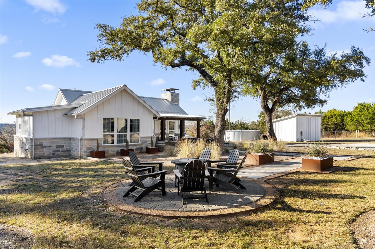 View 810-2 Kothmann Rd 810-2 Kothmann Rd - front exterior - Luxury home in Dripping Springs, TX