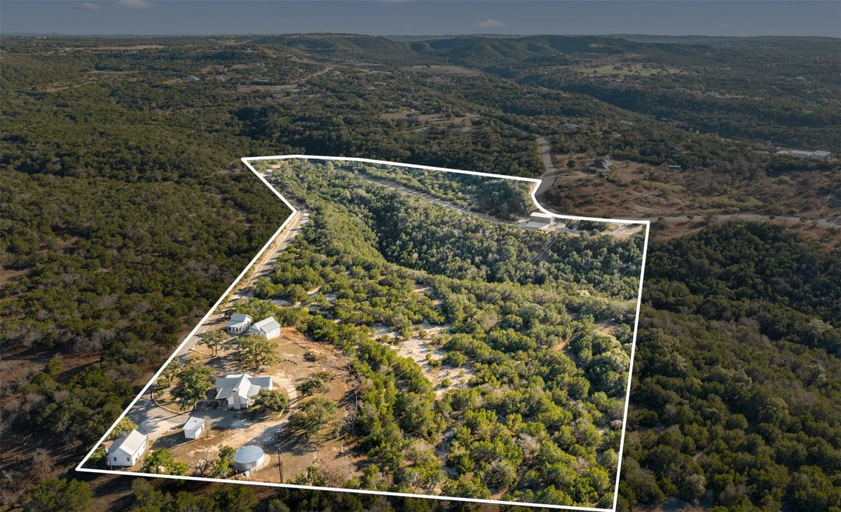 View 810 Kothmann Rd 810 Kothmann Rd - front exterior - Luxury home in Dripping Springs, TX