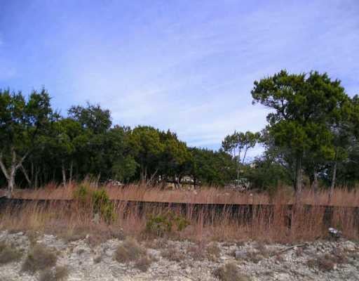 View 8103 Bronco Ln 8103 Bronco Ln - front exterior - Luxury lot in Lago Vista, TX