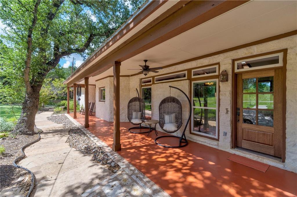 View 8104 Bear Creek Dr in Rose Subd Lots 1-2 594 Ac 8104 Bear Creek Dr - front exterior - Luxury home in Rose Subd Lots 1-2 594 Ac, Austin, TX